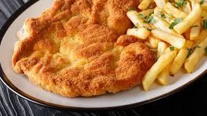 cotoletta e patatine (maiale) Piatti caldi